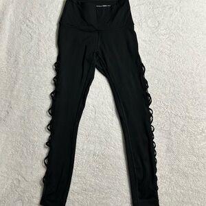 New Victoria's Secret Black Criss-Cross Side Leggings. Size 2.